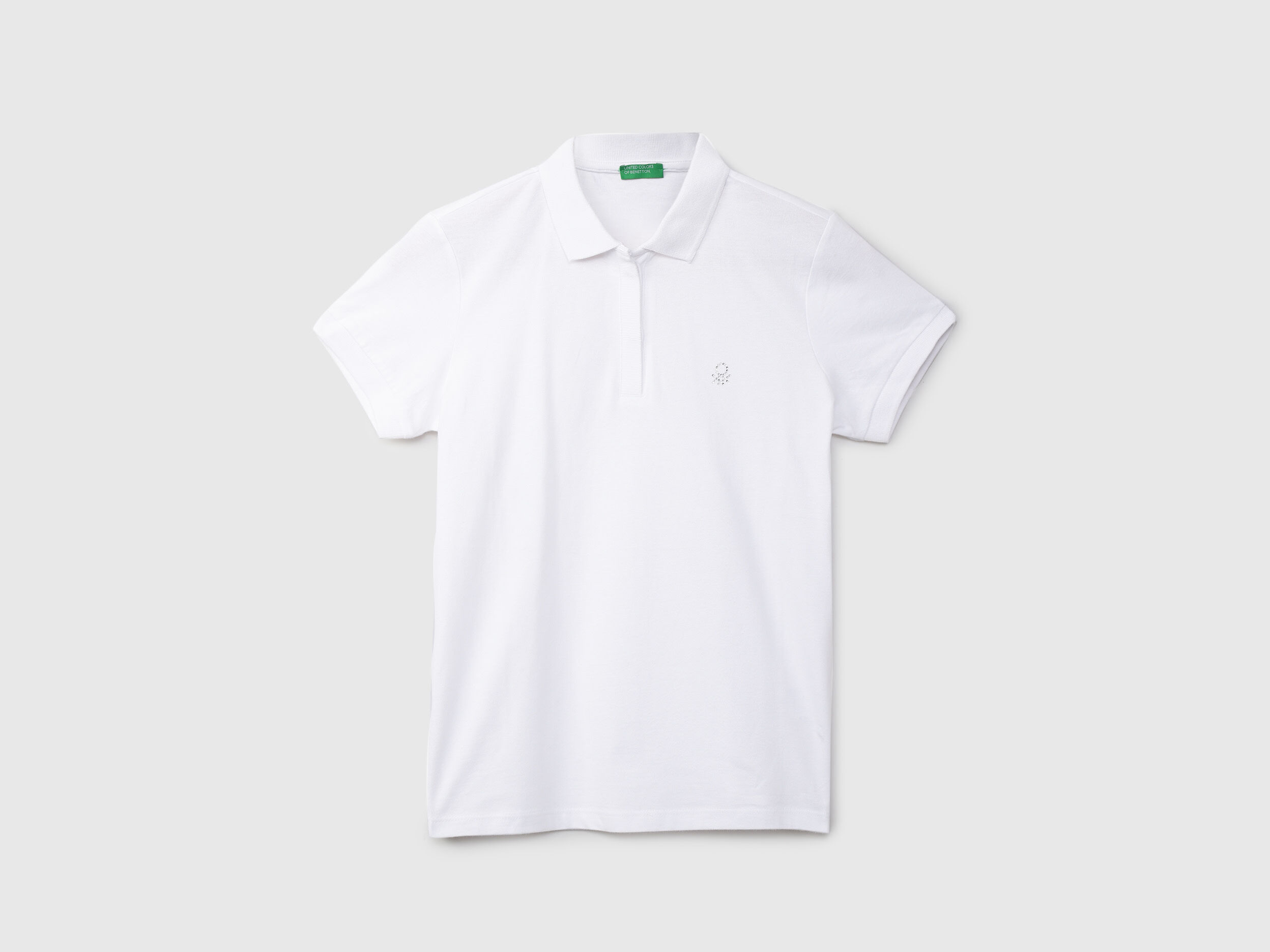 Polo blanco benetton on sale