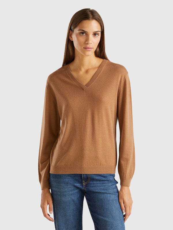 Jersey de pura lana merina con escote de pico Mujer