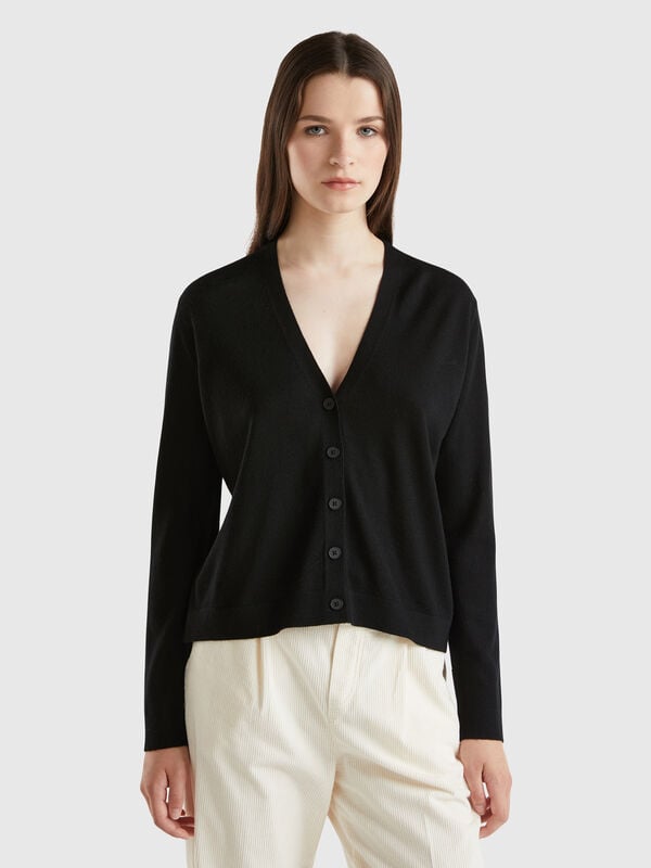 Jersey de pura lana merina con escote de pico Mujer