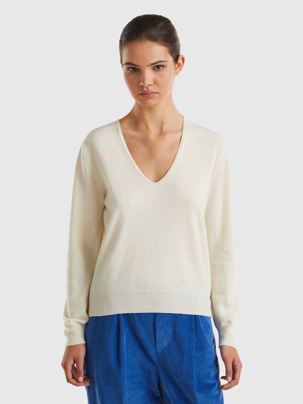 Jersey crema cuello en V en pura lana merina Mujer