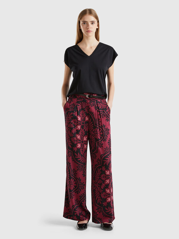 Pantalón fluido de flores Pantalón fluido de flores Mujer