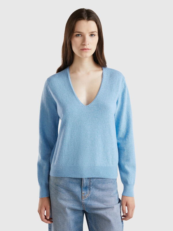 Jersey azul claro jaspeado cuello en V en pura lana merina Mujer