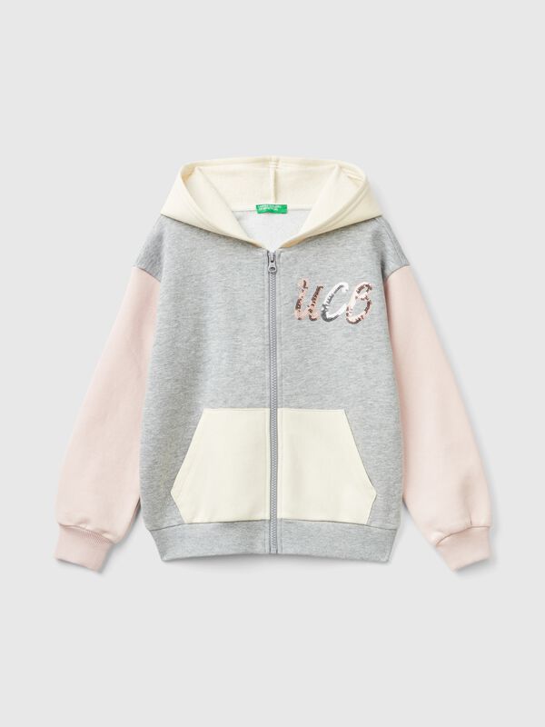 Sudadera con cremallera y lentejuelas Niña
