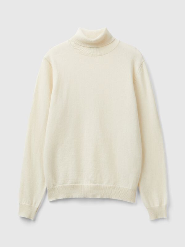 Suéter de cuello alto color crema en pura lana merino Mujer