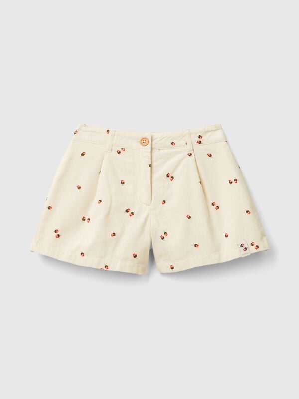 Pantalón de pana con estampado de rosas Niña