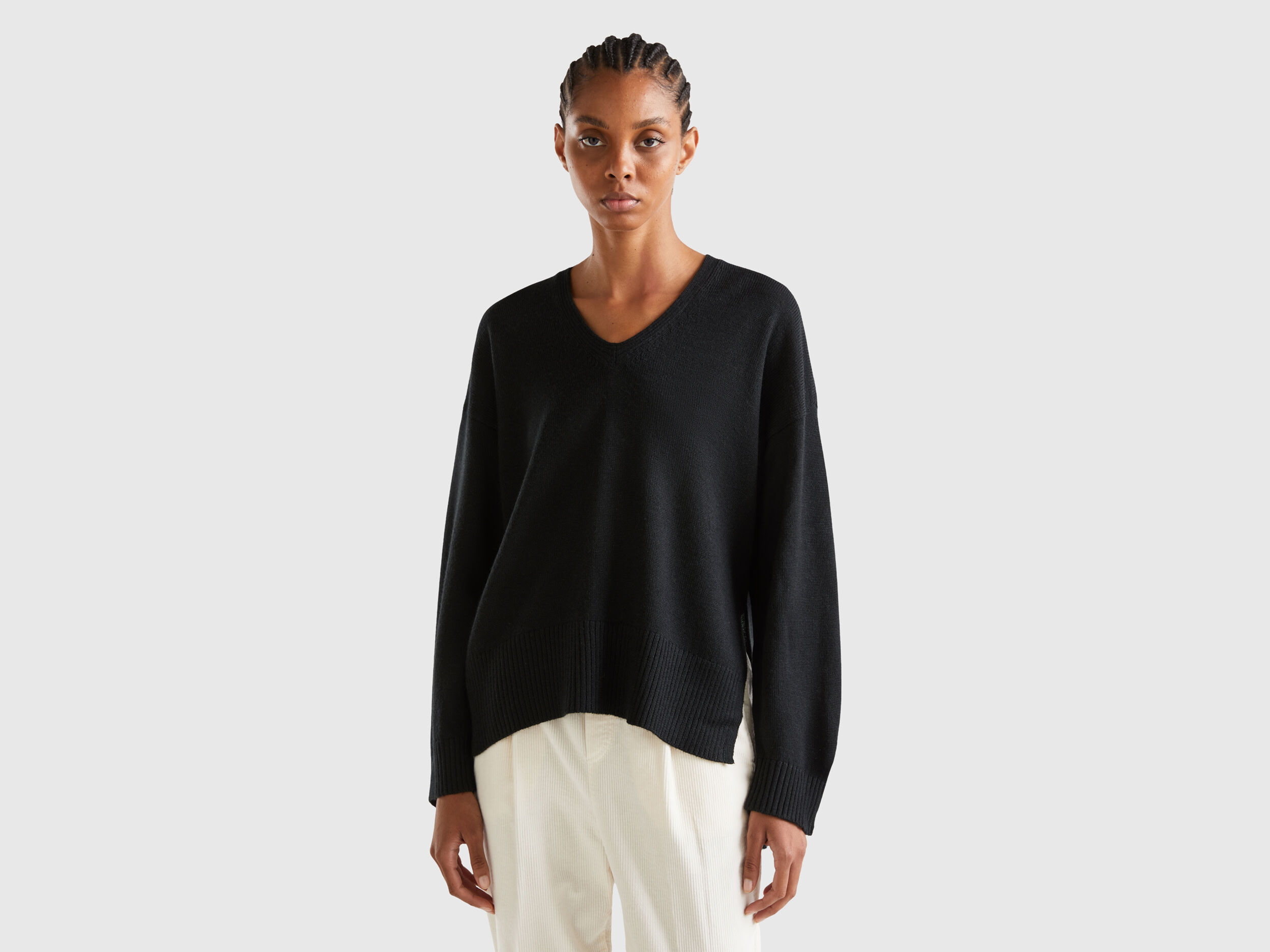 Jersey cuello pico over fit Negro Benetton