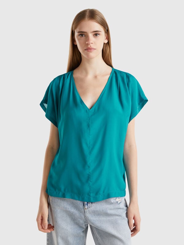 Blusa fluida de manga corta Mujer