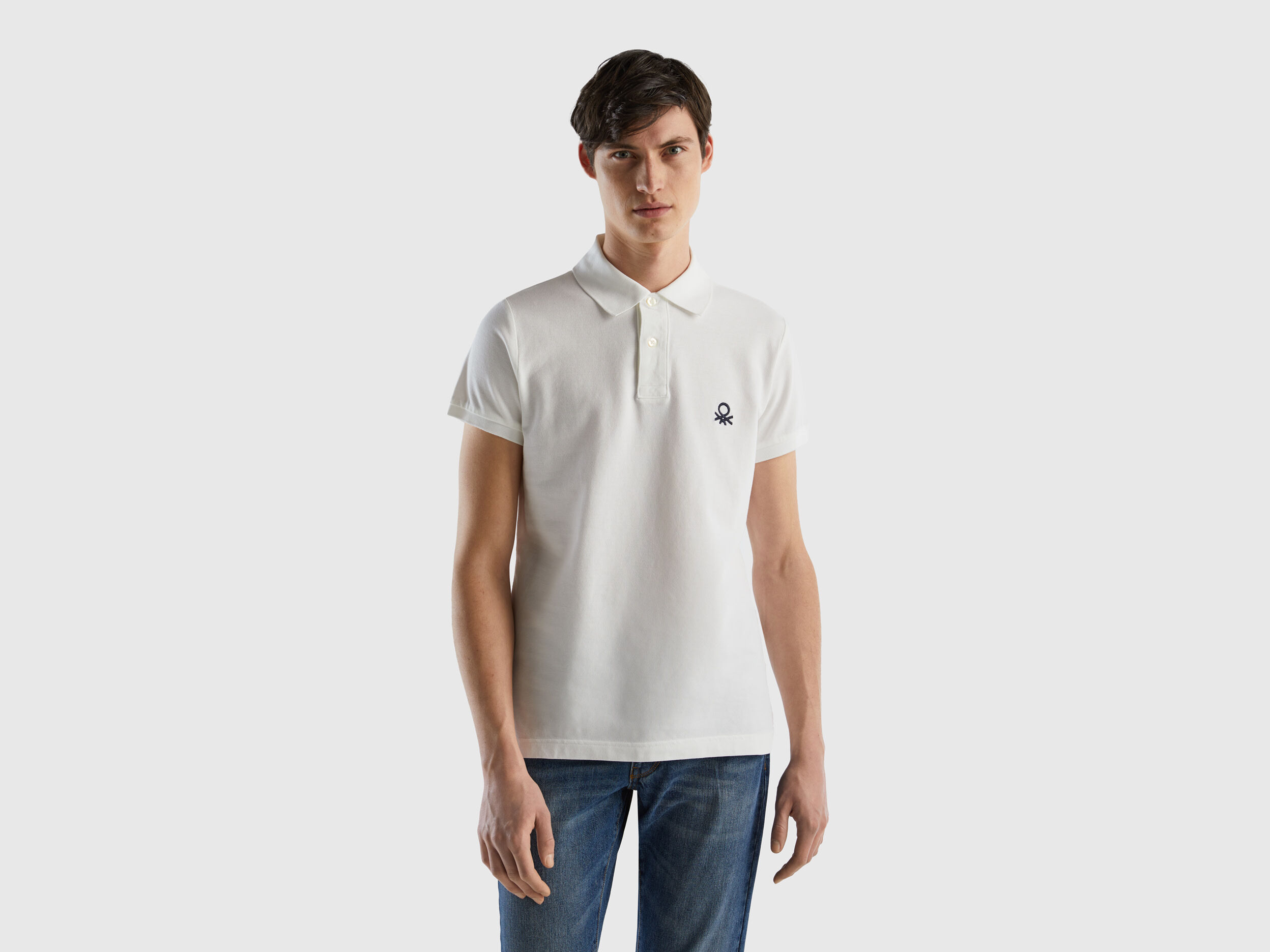 Polo blanco benetton on sale