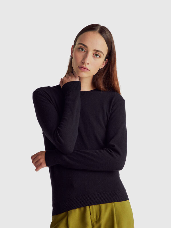 Suéter negro de cuello redondo en pura lana merino Mujer