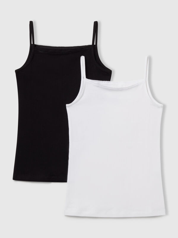 Dos camisetas interiores de algodón elástico Niña