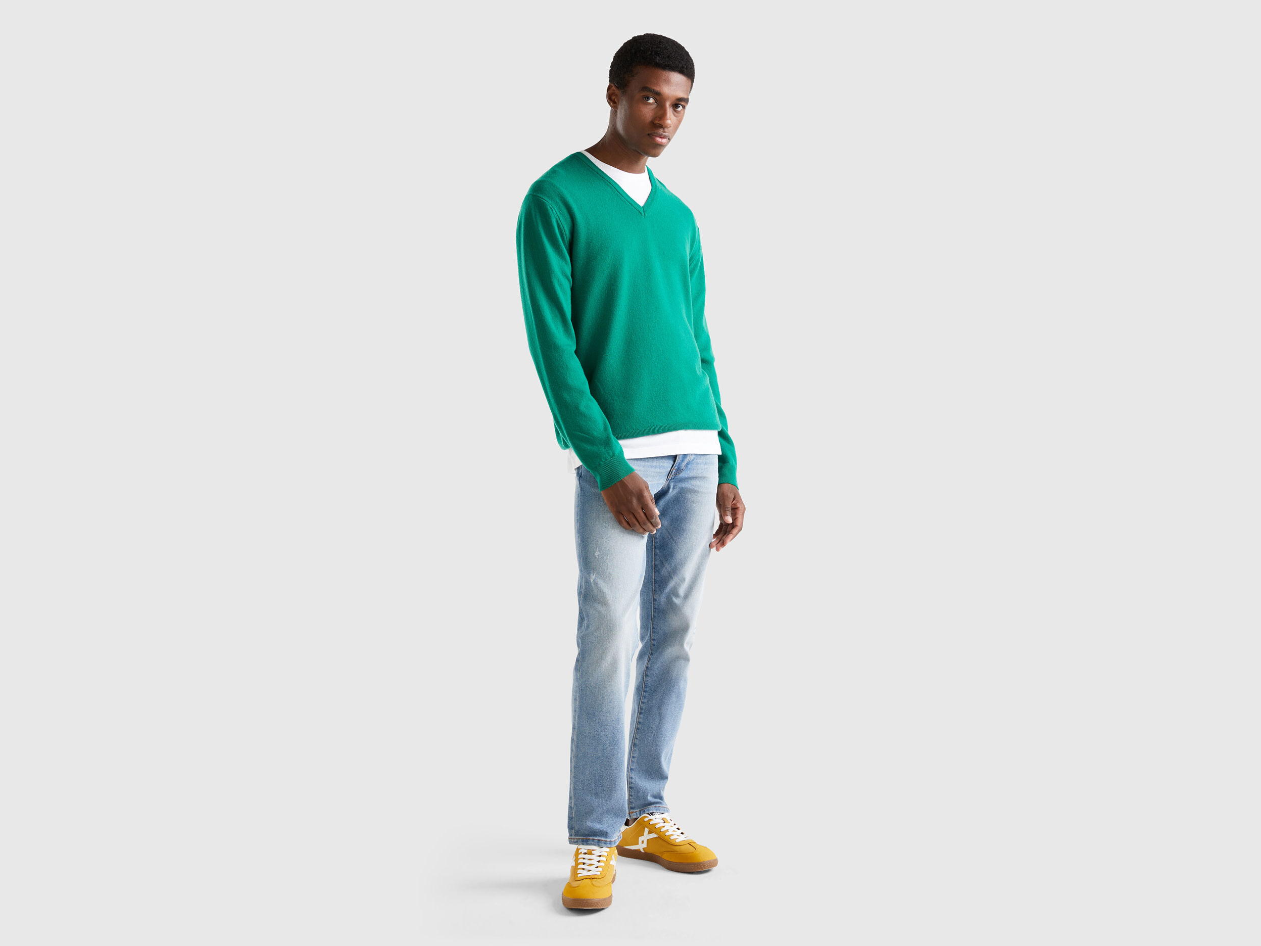 Green sweater blue jeans clearance