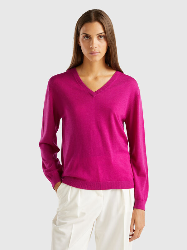 Jersey de pura lana merina con escote de pico Mujer